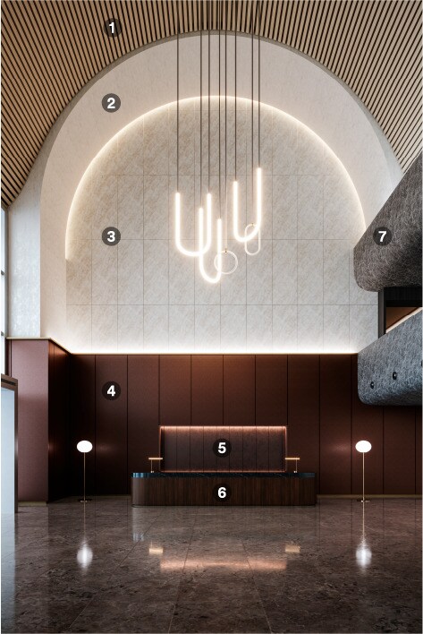 Amplia zona de recepción acabada con varios colores y texturas de acabados arquitectónicos.
