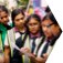 Group of young adults conversing with one another.