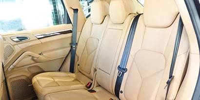 Image of car interior with tan leather seats
