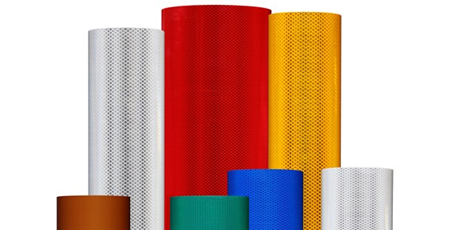 A group image of multiple different colors of 3M Reflective Sheeting rolls.
