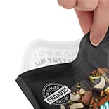 Image of a hand resealing a plastic pouch